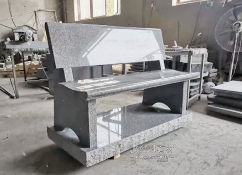 Grey granite tombstone bench with backrest